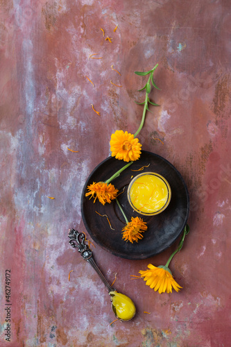 Dried marigold blossoms and marigold salve