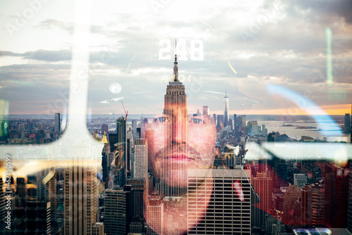 Portrait of confident firefighter with the reflected skyline of New York City, United States