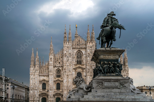 Italy, Milan, Monument to King Victor Emmanuel II  and Milan Cathedral on Piazza del Duomo photo