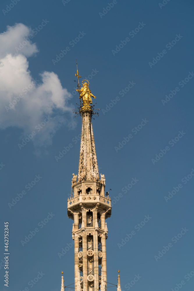 Italy, Milan, golden Madonna on top of Milan Cathedral Italy, Milan, golden Madonna on top of Milan Cathedral