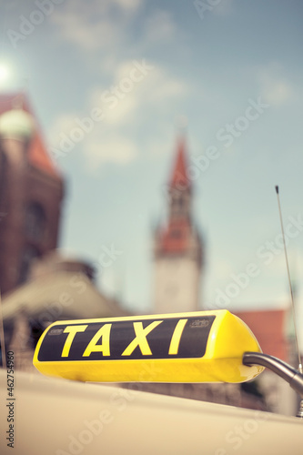 Black and yellow taxi sign