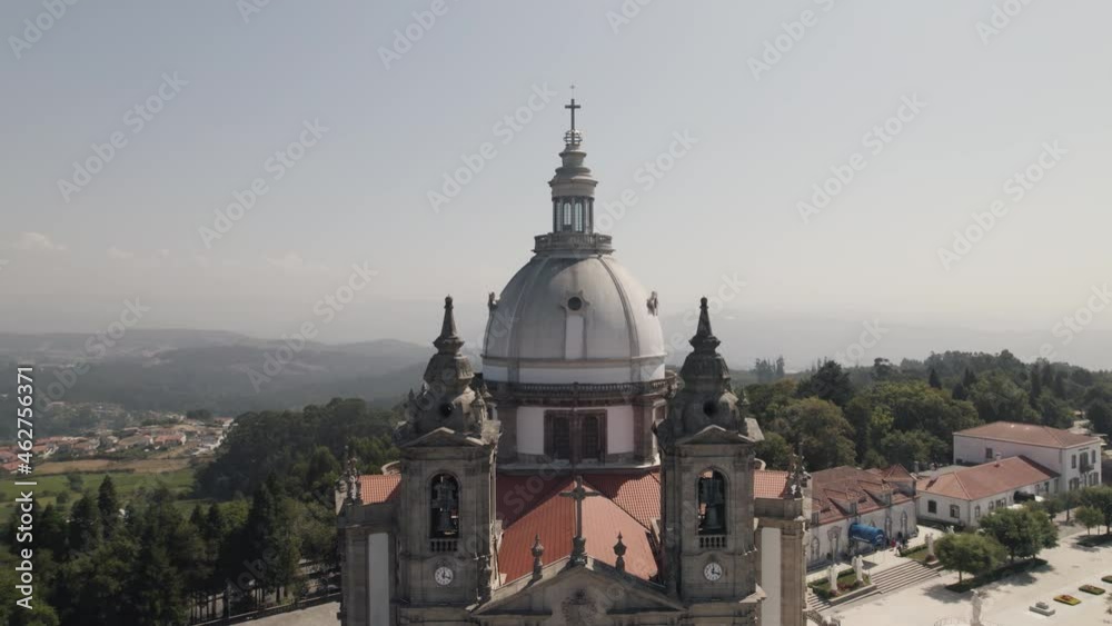 Church dome and bell towers, Sameiro Sanctuary, Braga, Portugal. Aerial pullback 