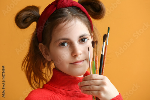 Cute little painter with br...