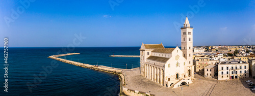 Italy, Province of Barletta-Andria-Trani, Trani, Helicopter panorama of Trani Cathedral and coastal harbor photo