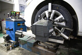 Do four-wheel alignment in the garage