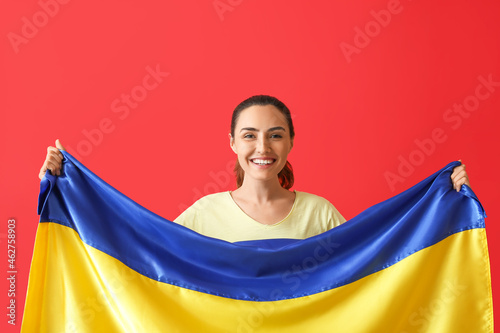 Happy young woman with Ukra...