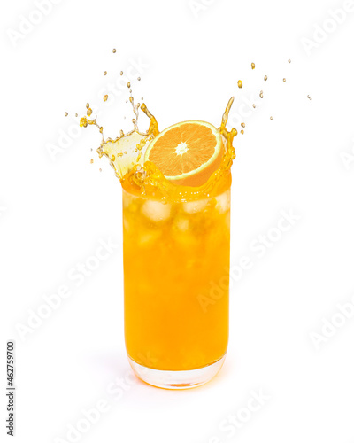 glass of orange juice with splash and orange fruit isolated on white background.