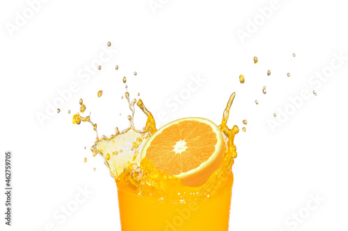 Oranges and glass of orange juice with splash