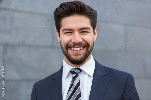 Portrait of bearded young businessman photo