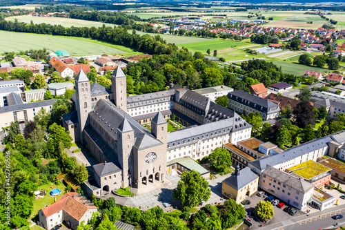 Aerial view of Munsterschwarzach Abbey during sunny day at Schwarzach, Bavaria, Germany photo