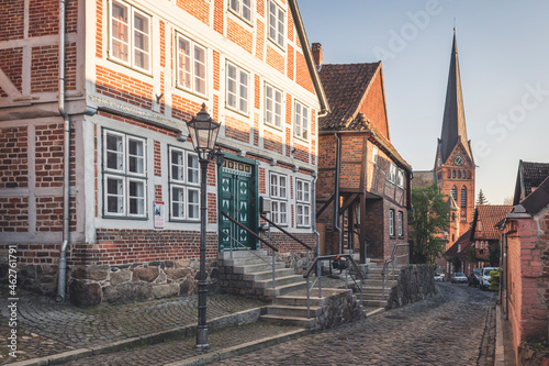 Half-timbered houses and Mary Magdalene church, Lauenburg, Schleswig-Holstein, Germany photo