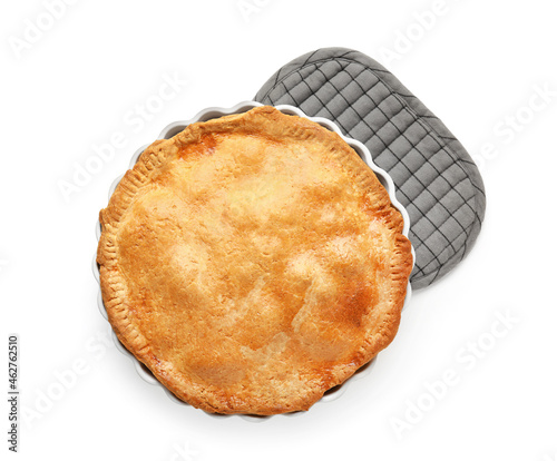 Baking dish with tasty chicken pot pie on white background