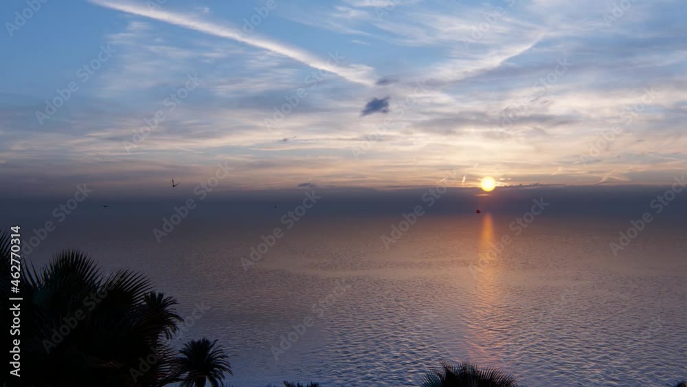Dramatic sea sunset. Burning sky and shining golden waves. Sunset sea 4k. Red sky, yellow sun and amazing sea. Summer sunset seascape. Atlantic Ocean beach sunsets. 
