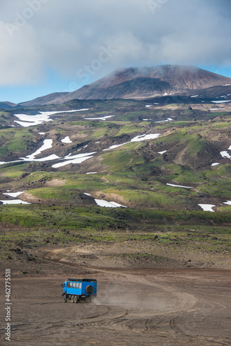 Russia, Kamchatka, Gorely volcano, truck driving through the lava sand photo
