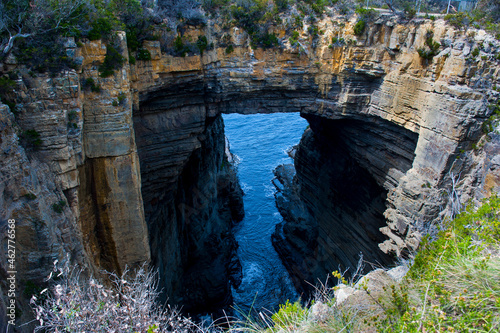 Tasman Arch and Devils Kitchen, Tasman Peninsula, Tasmania, Australia photo