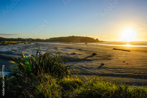 Sunset at Cape Foulwind near Westport, South Island, New Zealand photo