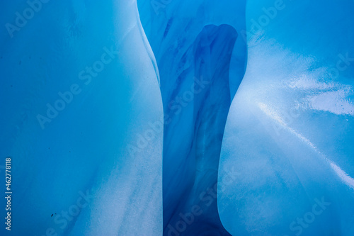 Blue ice in an ice cave in the Fox Glacier, South Island, New Zealand photo