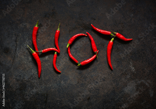 Red chili peppers arranged in word photo