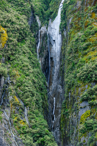 Huge waterfall on the bottom of the Franz Josef Glacier, South Island, New Zealand