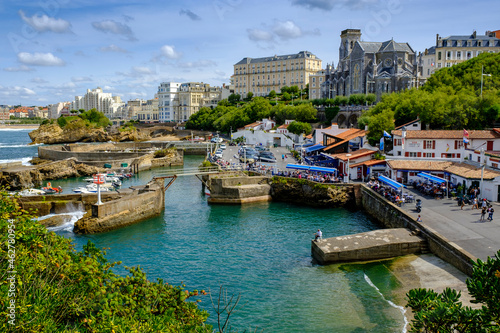 France, Pyrenees-Atlantiques, Biarritz, Le Port des Pecheurs marina with Church of Saint Eugenie in background