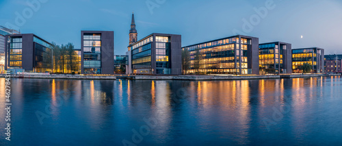 Denmark, Copenhagen, Panorama of Christianshavn district waterfront at dusk