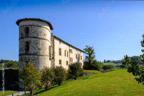 France, Pyrenees-Atlantiques, Espelette, Clear blue sky over old town hall photo