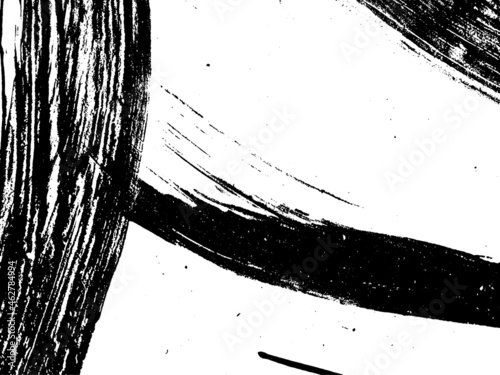 Grunge is black and white. Texture of black strokes on a white background. Abstract chaotic movements with a dry brush. Monochrome pattern of worn surface