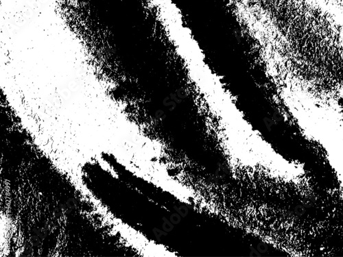 Grunge is black and white. Texture of black strokes on a white background. Abstract chaotic movements with a dry brush. Monochrome pattern of worn surface