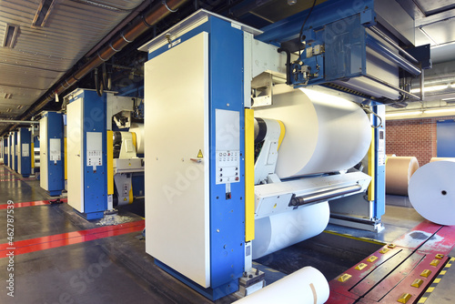 Printing shop: paper roll in a printing press