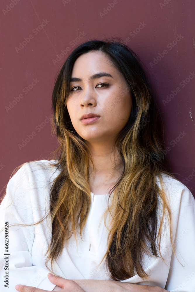 Portrait of young woman wearing white blouse Portrait of young woman wearing white blouse