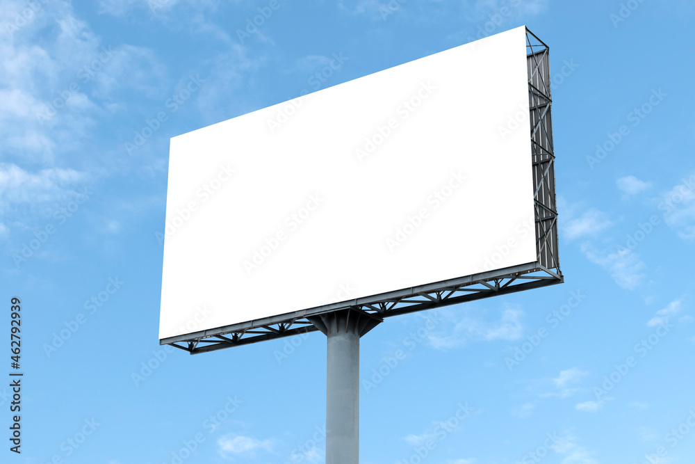 Outdoor billboard on blue sky background with white background mock up. clipping path Outdoor billboard on blue sky background with white background mock up. clipping path