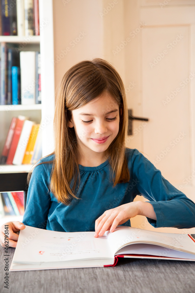 Girl reading a book Girl reading a book