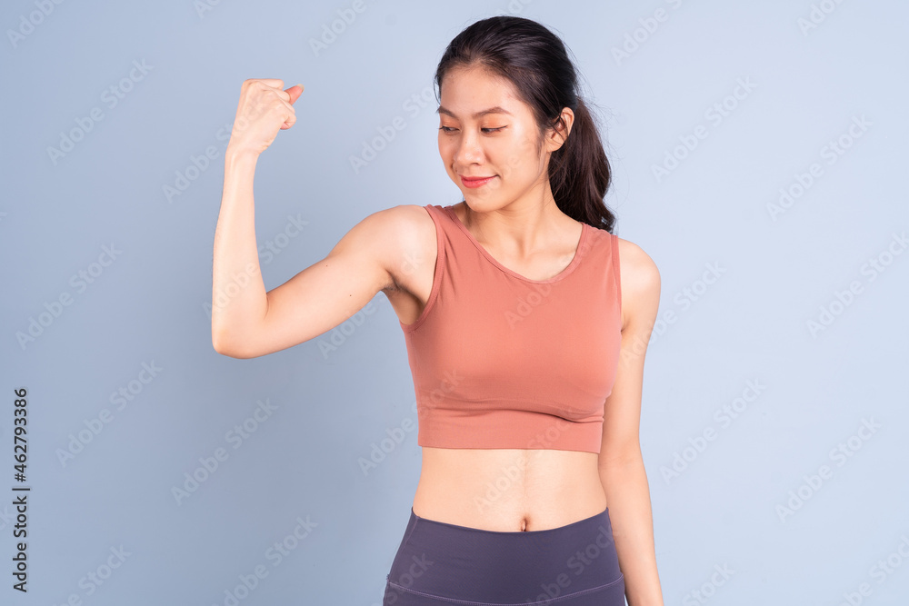 Beautiful Asian woman wearing sportswear and doing yoga, fitness and gym concept Beautiful Asian woman wearing sportswear and doing yoga, fitness and gym concept