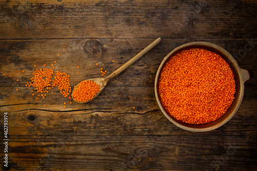 Overhead view of bowl of organic red lentils photo