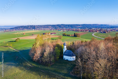 Aerial view of Chapel St. Georg, Ascholding near Dietramszell, Upper Bavaria, Germany photo