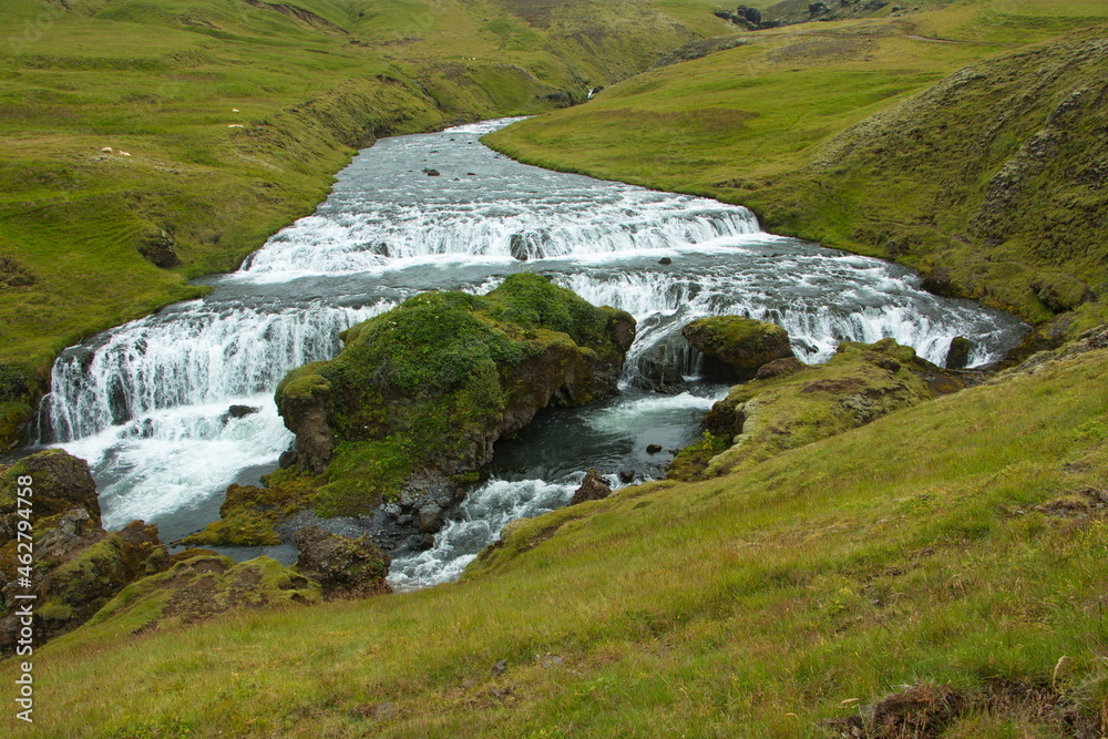 Waterfall Steinbogafoss over Skogafoss on Iceland, Europe

