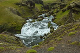 Waterfall Steinbogafoss over Skogafoss on Iceland, Europe
