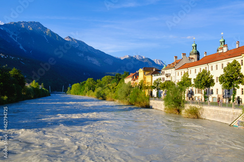 Inn with cathedral by river at Innsbruck, Austria
