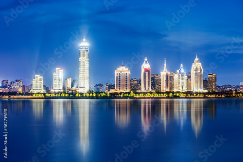 Night view of modern city, Wuhan, China。