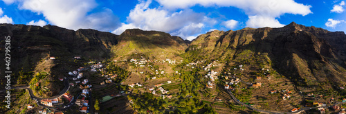 Spain, Canary Islands, La Gomera, Valle Gran Rey, El Retamal and La Vizcaina, Aerial view of towns and mountains photo