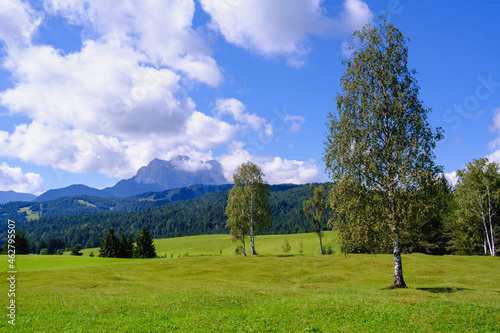 Scenic view of humpback meadows against sky at Mittenwald, Werdenfelser Land, Upper Bavaria, Bavaria, Germany photo