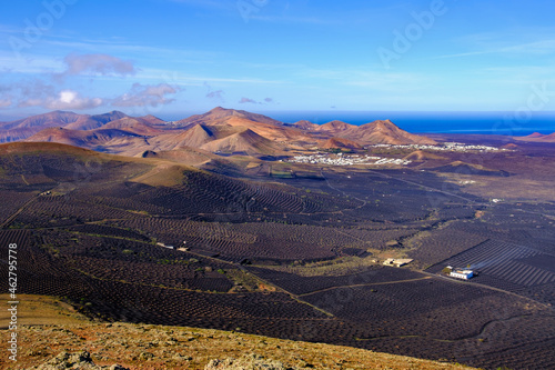 Spain, Canary Islands, Lanzarote, La Geria region, Vineyards and hills photo