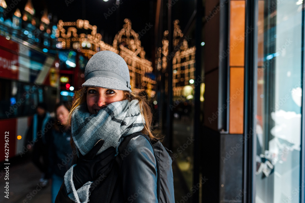 Smiling woman in the city of London in winter Smiling woman in the city of London in winter