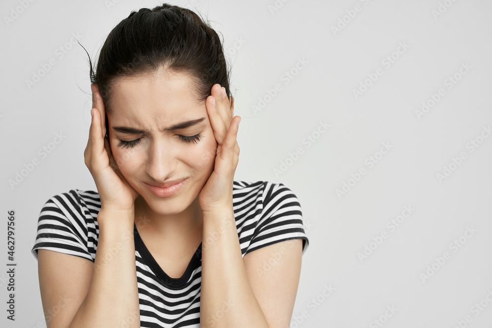 woman holding his head migraine depression light background woman holding his head migraine depression light background