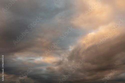 Beautiful clouds at sunrise. Light pastel colors. Nature background. © mark_gusev