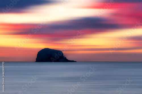 UK, Scotland, Firth of Forth at moody sunrise with silhouette of Bass Rock in background