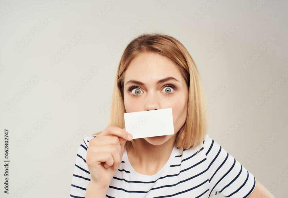 pretty woman with a business card in hand Copy space pretty woman with a business card in hand Copy space