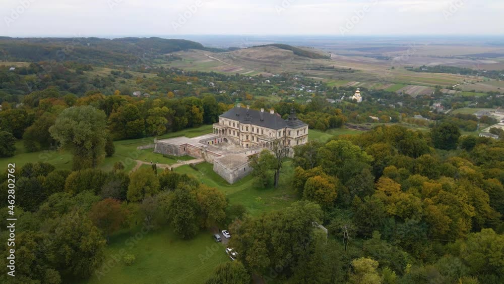 Picturesque View With Old Castle Fortress Of Pidhirtsi In Lviv Region, Western Ukraine. Aerial Drone Picturesque View With Old Castle Fortress Of Pidhirtsi In Lviv Region, Western Ukraine. Aerial Drone