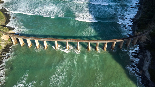 South Africa, Wilderness, Aerial view of the Kaaimans River bridge and ocean photo