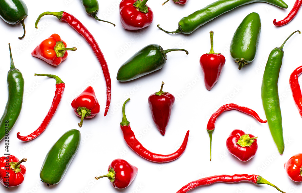 Pattern of hot peppers on white close up top view, flat lay. Pattern of hot peppers on white close up top view, flat lay.